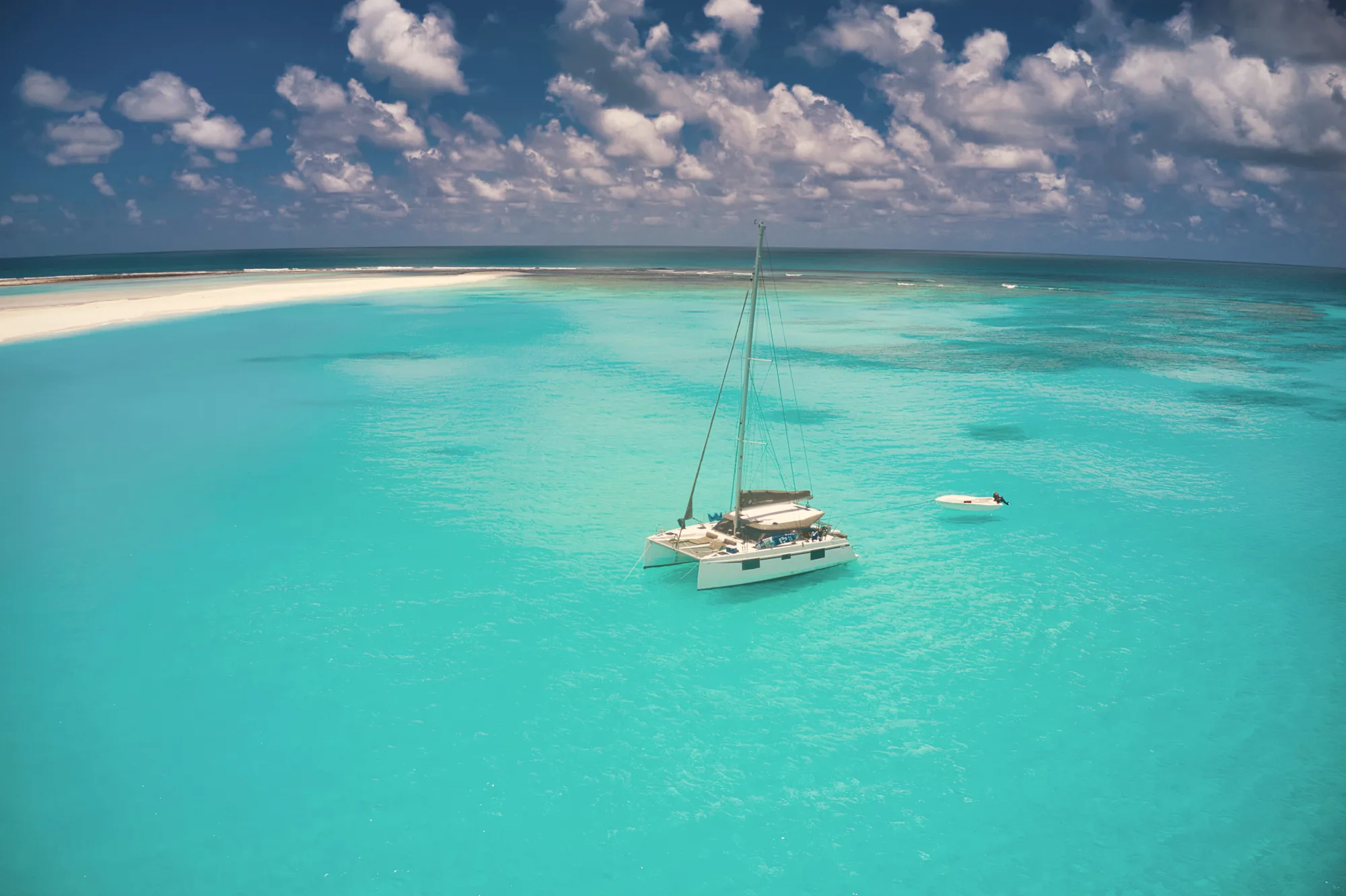 Catamaran on turquoise lagoon water, Mauritius